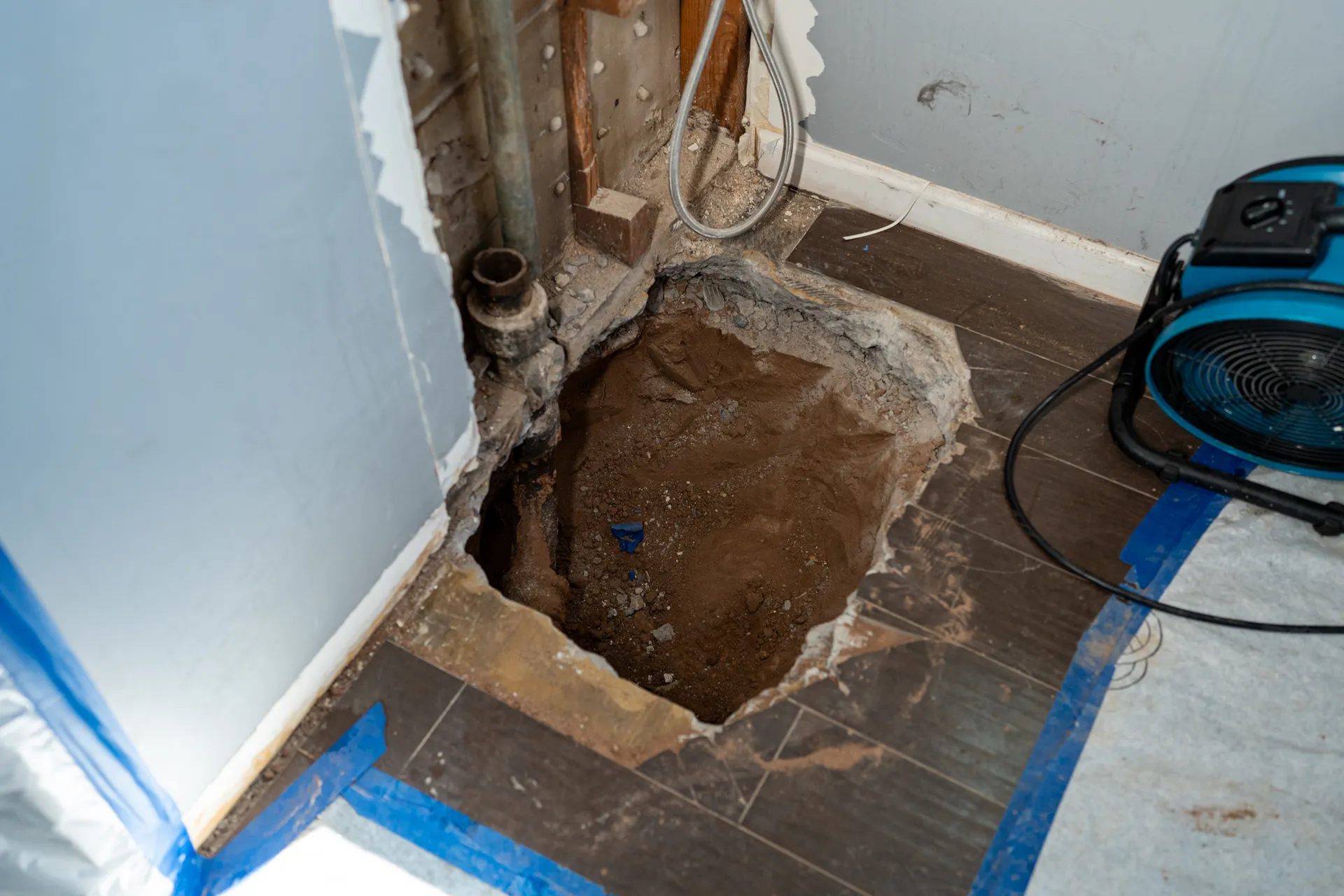 A drain line dug up and cleared by Warriors Plumbing & Rooter in a Phoenix home